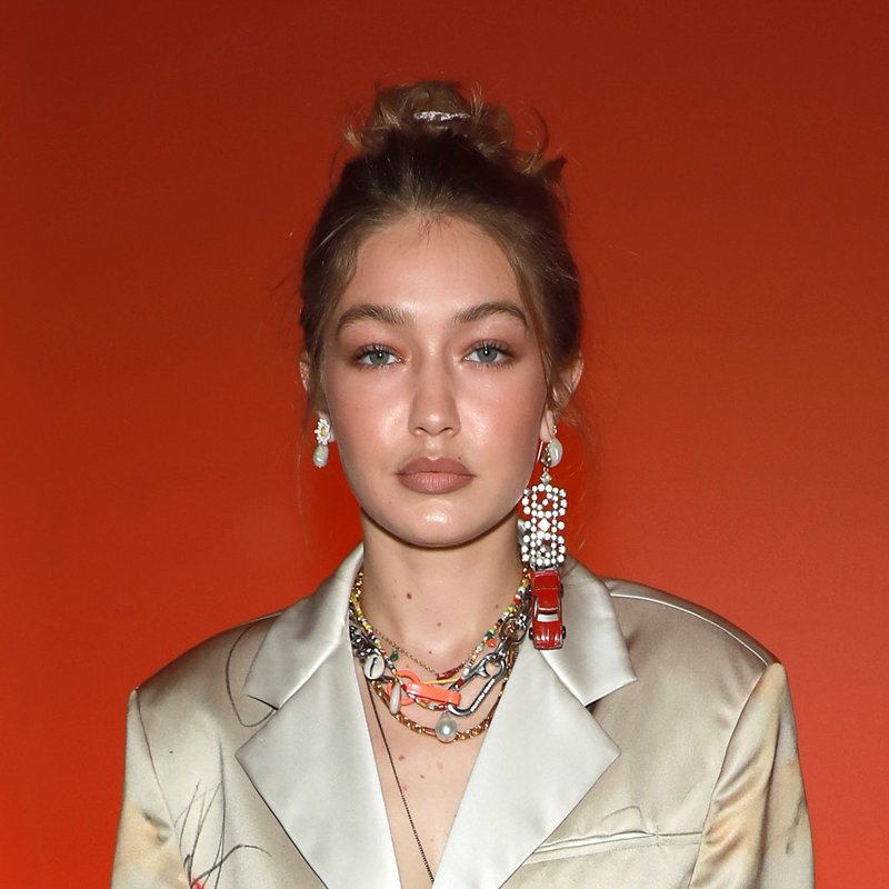 Gigi Hadid Wore A Heron Preston Suit Decorated With A Spray Paint Print ...